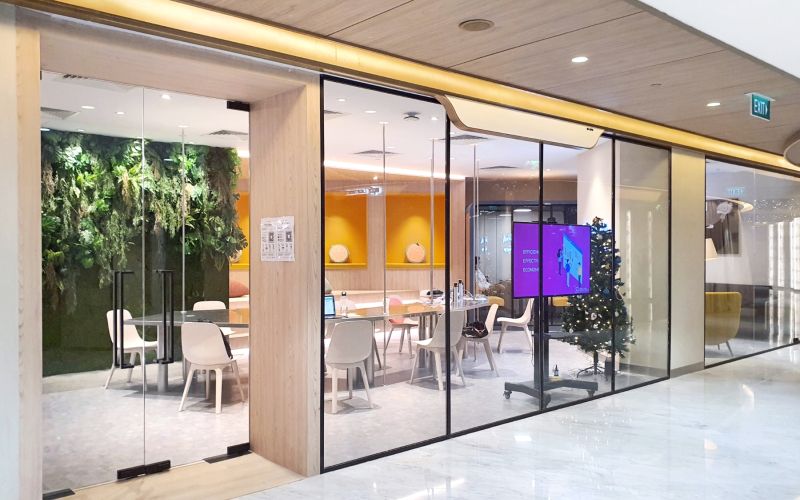 Sleek Glass Door and Partition for Coworking Space Design
