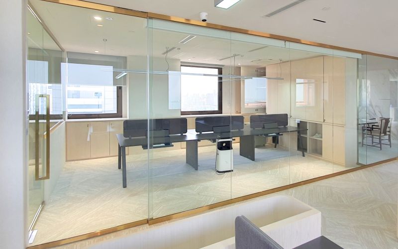 Glass Partition with Gold Capping for Offices