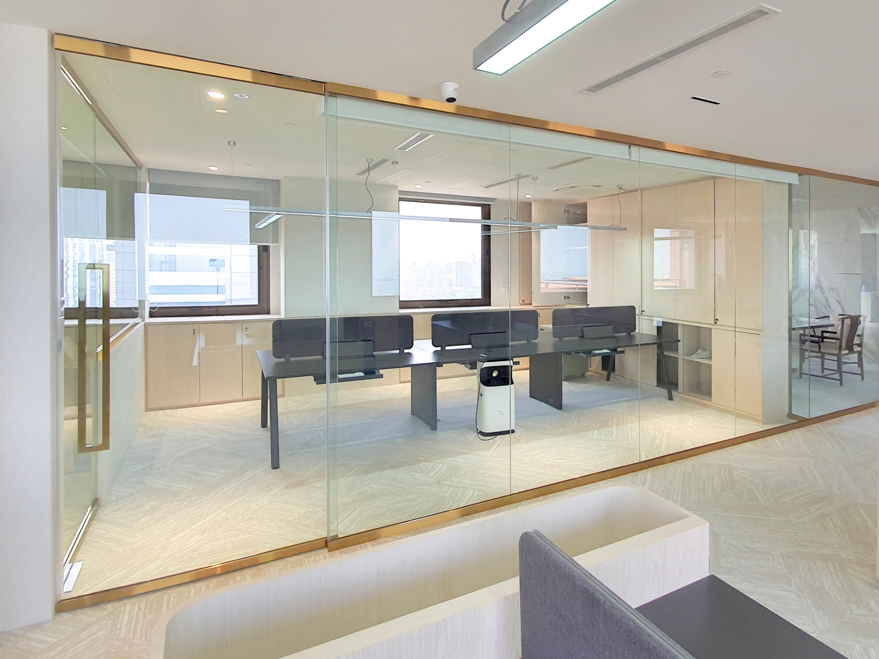Glass Partition with Gold Capping for Offices