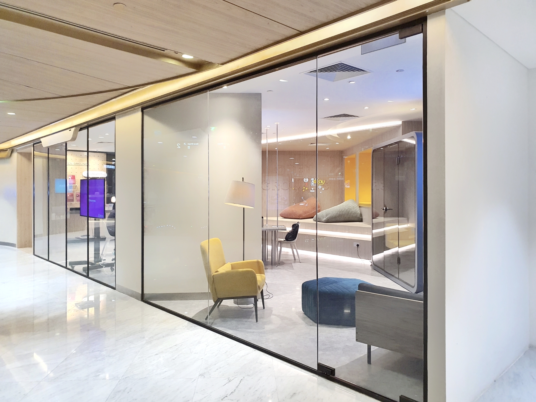 Sleek Glass Door and Partition for Coworking Space Design